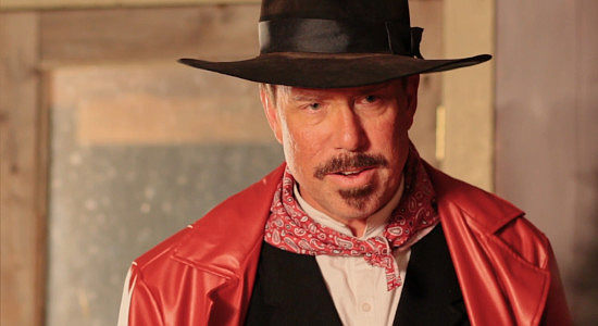 Kelly Kid as Billy Belle, the man who wants $2,000 or Reina's ranch in Reina of the West (2022)