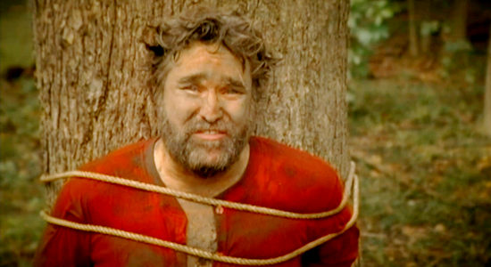 Kevin Keats as a bad man named Johnny, begging for mercy in FIrst Seal Revelations (2025)