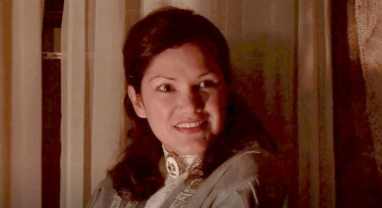 Marita De La Torre as Estrella, trying to calm Laura when the lepers show up in The Magnificent Dead (2010)