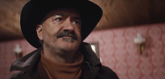 Matt Servitto as Frank Sparks, working on a plan to slip the law, rob the bank, then escape town in A Town Called Purgatory (2025)