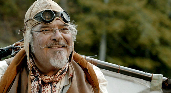 Michael A. Candela as Birdman Whaller, too wrapped up in inventing for a brighter tomorrow to worry about today's Civil War in Marbles and Bullets (2025)