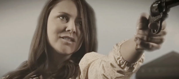 Miranda Byers as Rose, proving she's quite capable of protecting herself in Jack Wyatt and the Gun from Hell (2021)