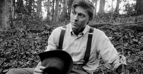 Nigel Butler as Todd, missing home and growing more concerned about Curt Cater's gold obsession in Buried on Shine Mountain (2024)