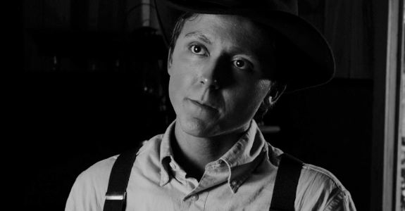 Nigel Butler as Todd, the young man reluctant to follow Curt Carter into the hills in Buried on Shine Mountain (2024)