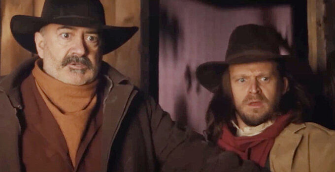 Matt Servcitto as Frank Sparks and Claudius von Stolzmann as son Henry making a gruesome discovery in A Town Called Purgatory (2025)