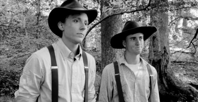 Nigel Butler as Todd and Gunnar Dalton as Henry 'Duck' Mallard, fretting about their traveling companion in Buried on Shine Mountain (2024)