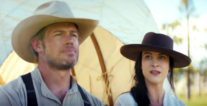 Trevor Donovan as Chase Logan and Ashley Elaine as Jessie Strong, traveling to their new home in Where the Wind Blows (2025)