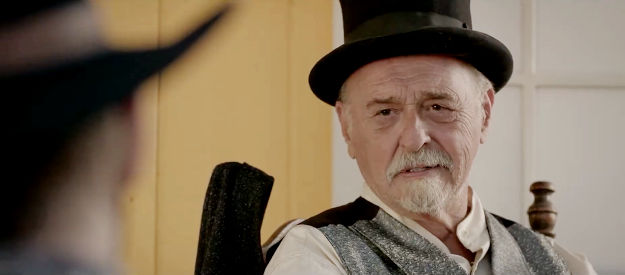 Peter Sherayko as the greedy Mayor Bigly, making his position clear to the sheriff in Shooting Star (2022)