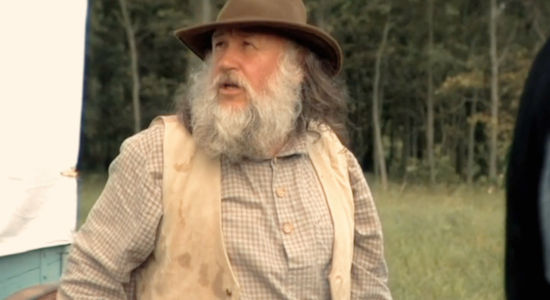 Rick Lane or Victor Pytko as the man helping fix a wagon in First Seal Revelations (2025)