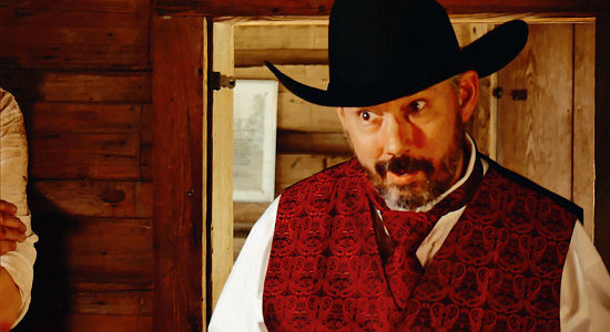 Thomas Barron Sampson as Rico, the man who threatens to take Sam's ranch in Reina of the West (2022)