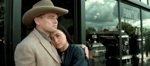 Leonardo DiCaprio as Ernest Burkhart and Lily Gladstone as his wife Mollie during a somber moment in Killers of the Flower Moon (2023)