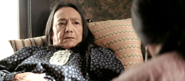 Tanto Cardinal as Lizzie Q, fretting that her family's blood is becoming too white in Flowers of the Killer Moon (2023)