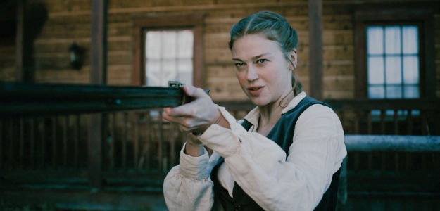 Adrianne Palicki as Liz, a business woman ready to stand up against corrupt lawman in The Wolf and the Lamb (2026)