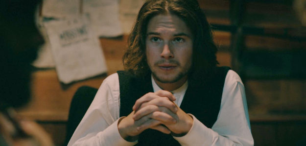 Elias Kacavas as Deputy Charlie Quinn, ready to stand up against Sheriff Frank Martin if necessary in The Wolf and the Lamb (2026)