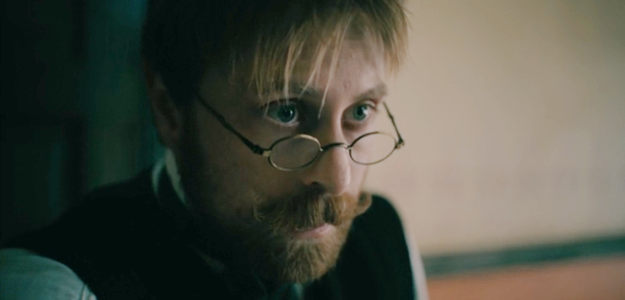 Eric Nelson as Dr. Roy Hawkins, admitting he's not quite sure what's wrong with Henry in The Wolf and the Lamb (2026)