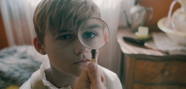 Jaydon Clark as Henry, under examination by the doctor after returning from the missing in The Wolf and the Lamb (2026)